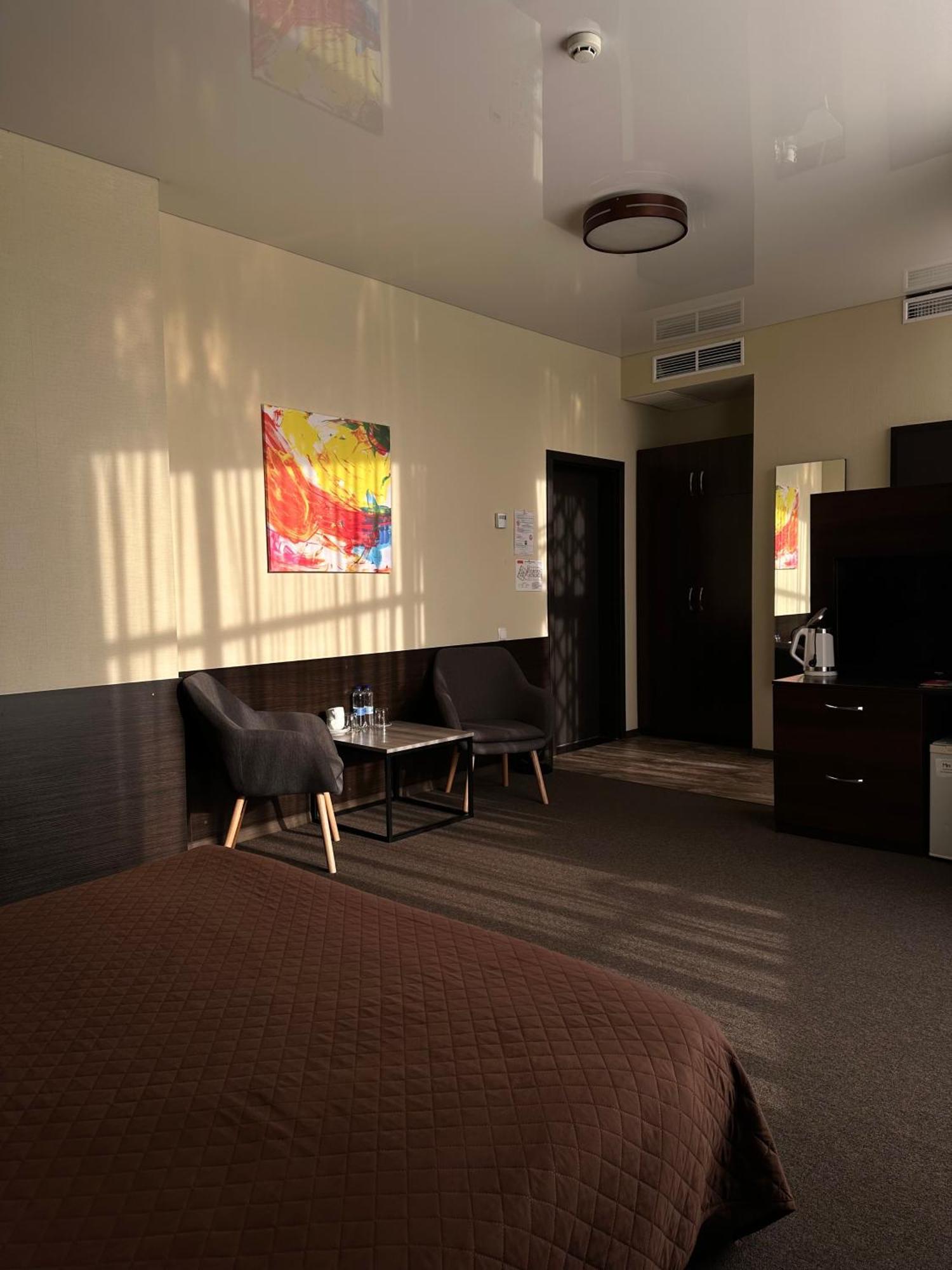 Hotel Atmosphere Poltava Quarto foto